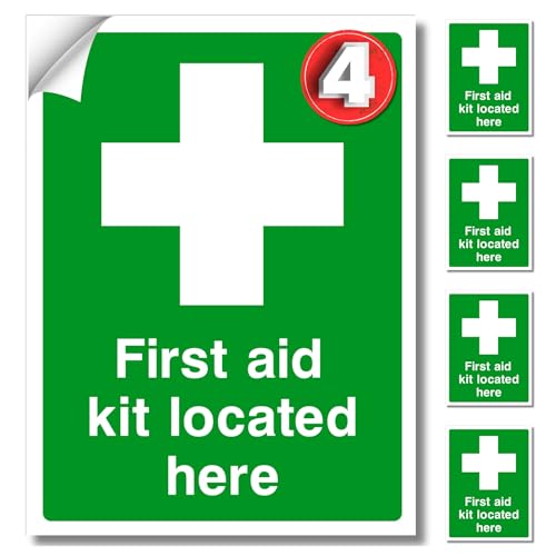 Set of first aid kit location signs with a prominent green cross symbol.