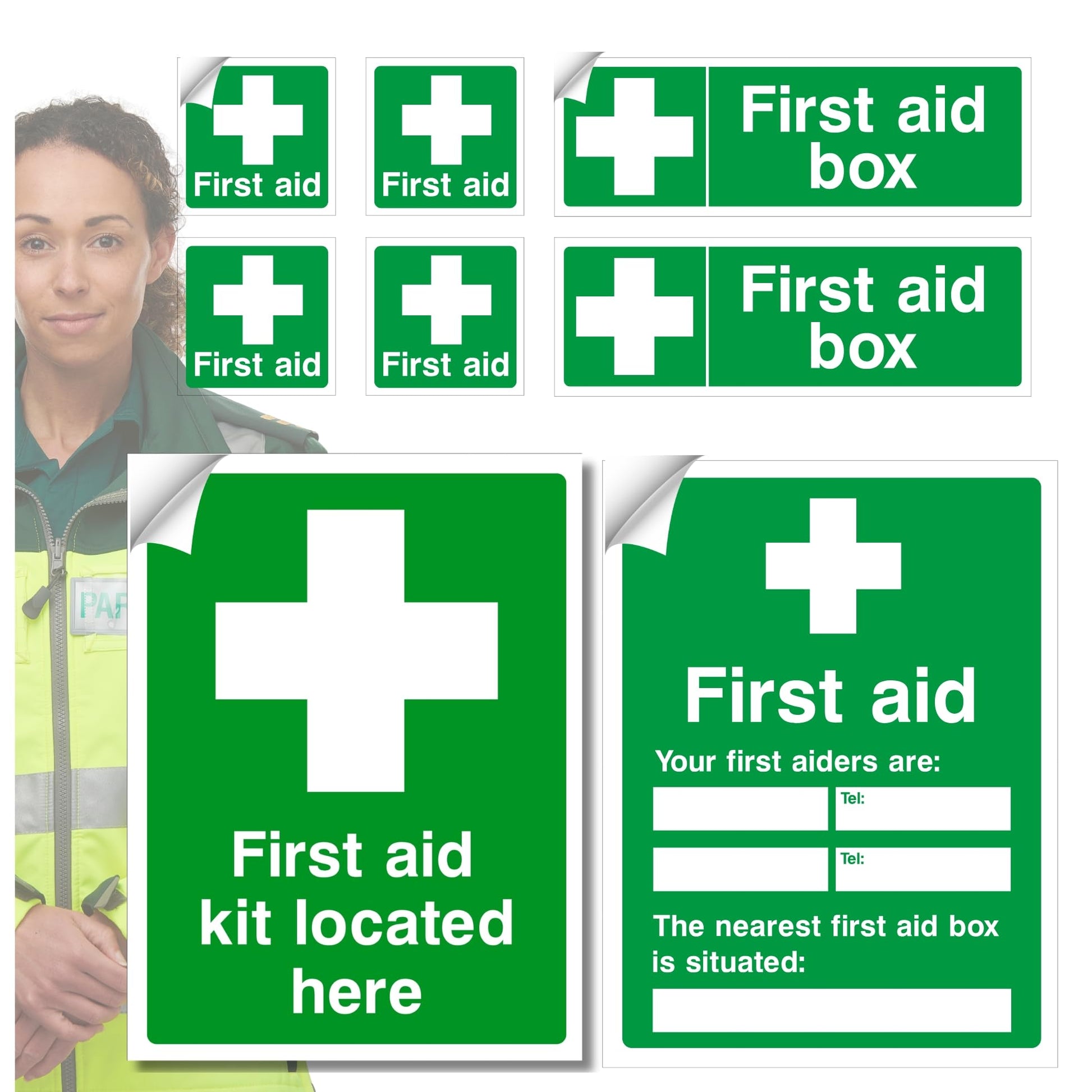 Collection of green first aid signs with white crosses and text, including 'First aid box' and 'First aid kit located here'.