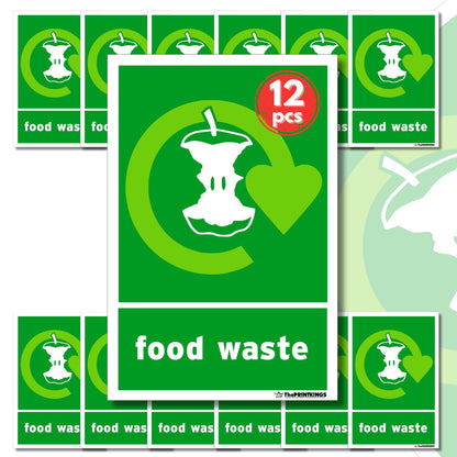 Collection of green 'food waste' signs with a central large sign and smaller ones around it.